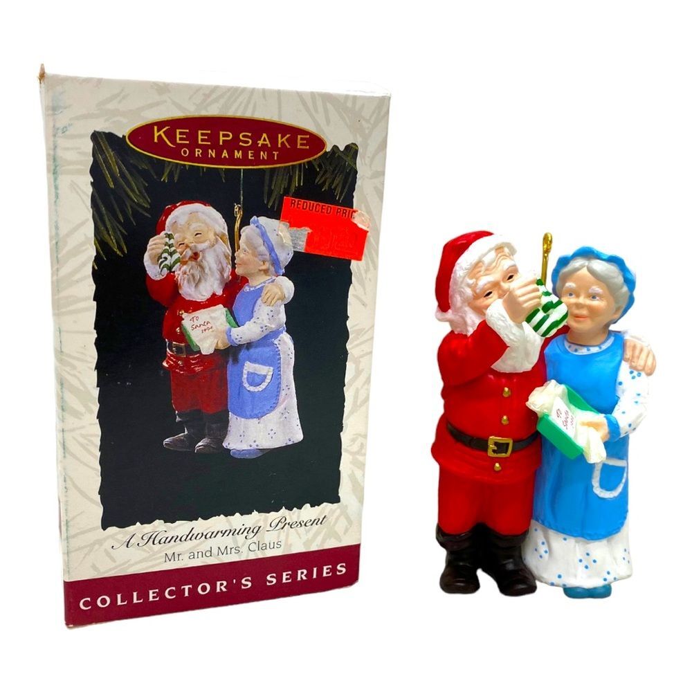 1994 Hallmark Keepsake A Handwarming Present Mr and Mrs Claus Ornament